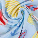 Close-up of colorful fabric with shell and starfish pattern