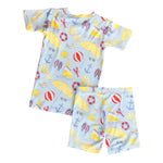 Children's loungewear set with a blue pattern featuring yellow umbrellas, red life buoys, and white clouds on a light beige background.