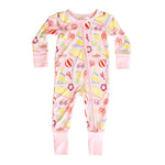 Pink baby onesie with colorful beach-themed print on a white background