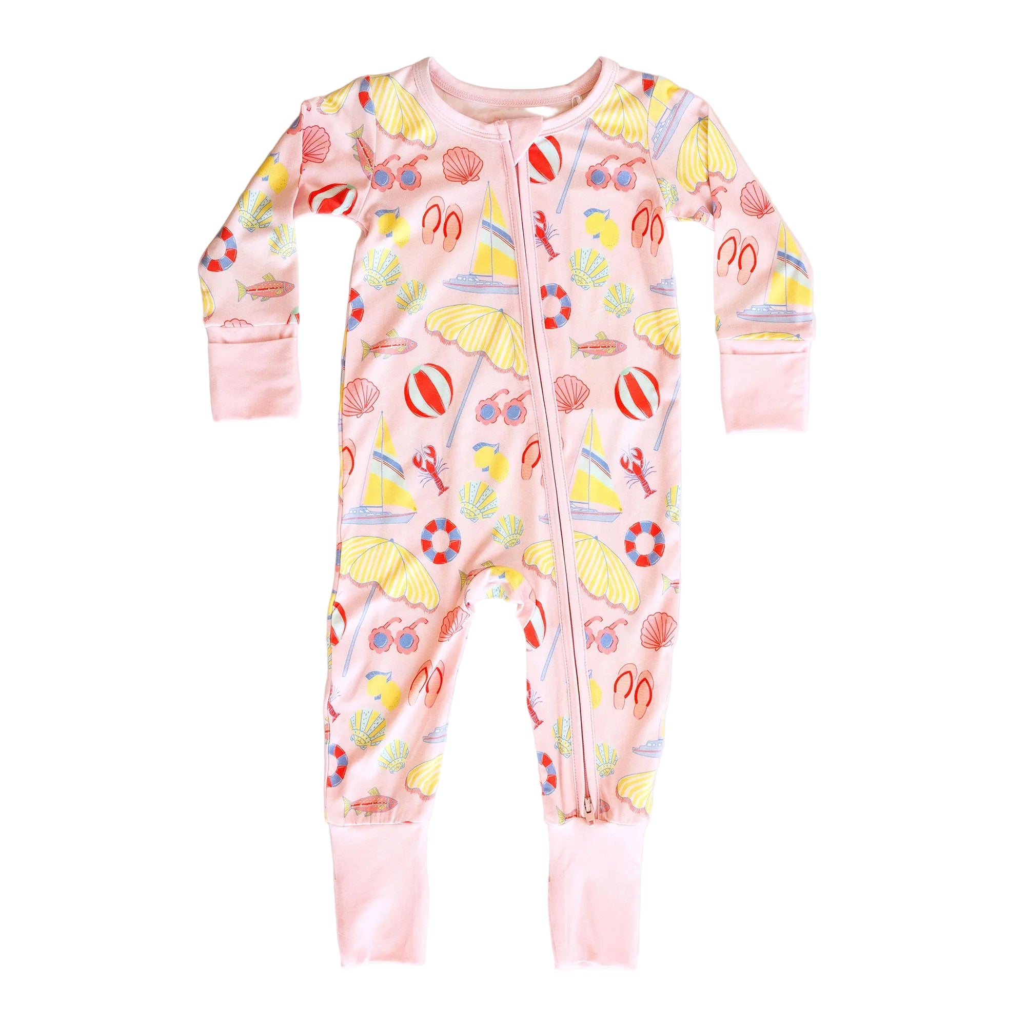 Pink baby onesie with colorful beach-themed print on a white background