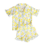 Children's two-piece set with lemon pattern on a white background