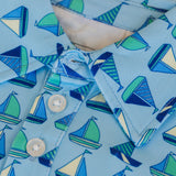 Close-up of a light blue fabric with sailboat pattern