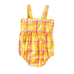 Yellow and pink plaid baby romper on a white background