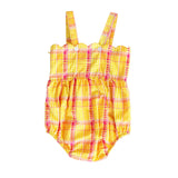 Yellow and pink plaid baby romper on a white background