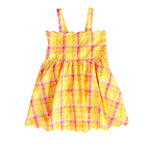 Yellow and pink plaid dress on a white background